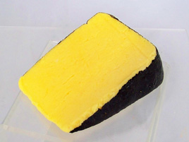Cheddar Cheese Wedge with Black Rind